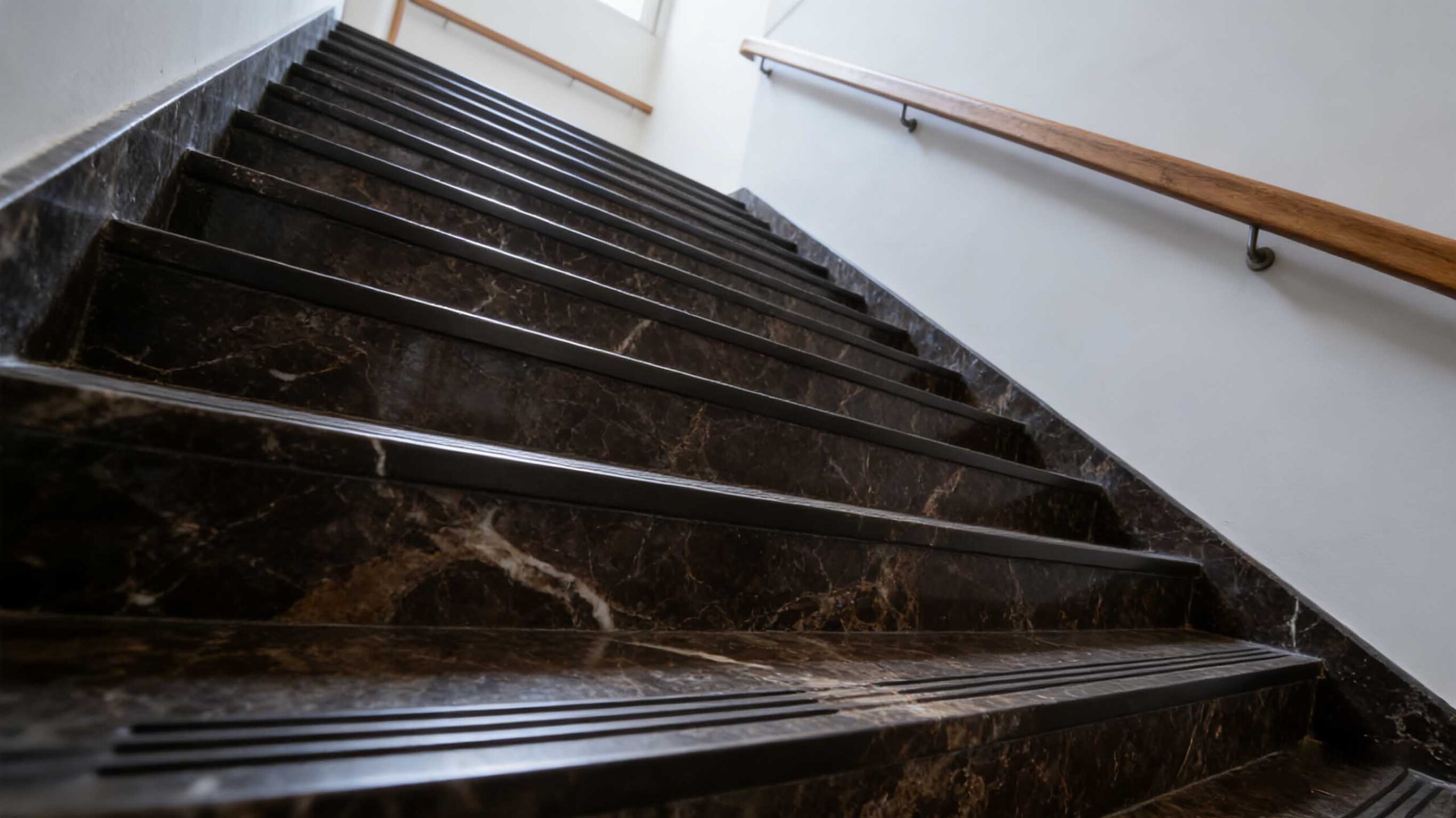 Emperador Dark Marble stairs used in high-end residential staircase applications