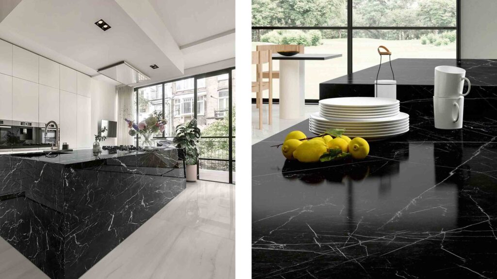 Black Marquina marble used for kitchen countertops, staircase treads, and bathroom vanity in a luxury residential interior