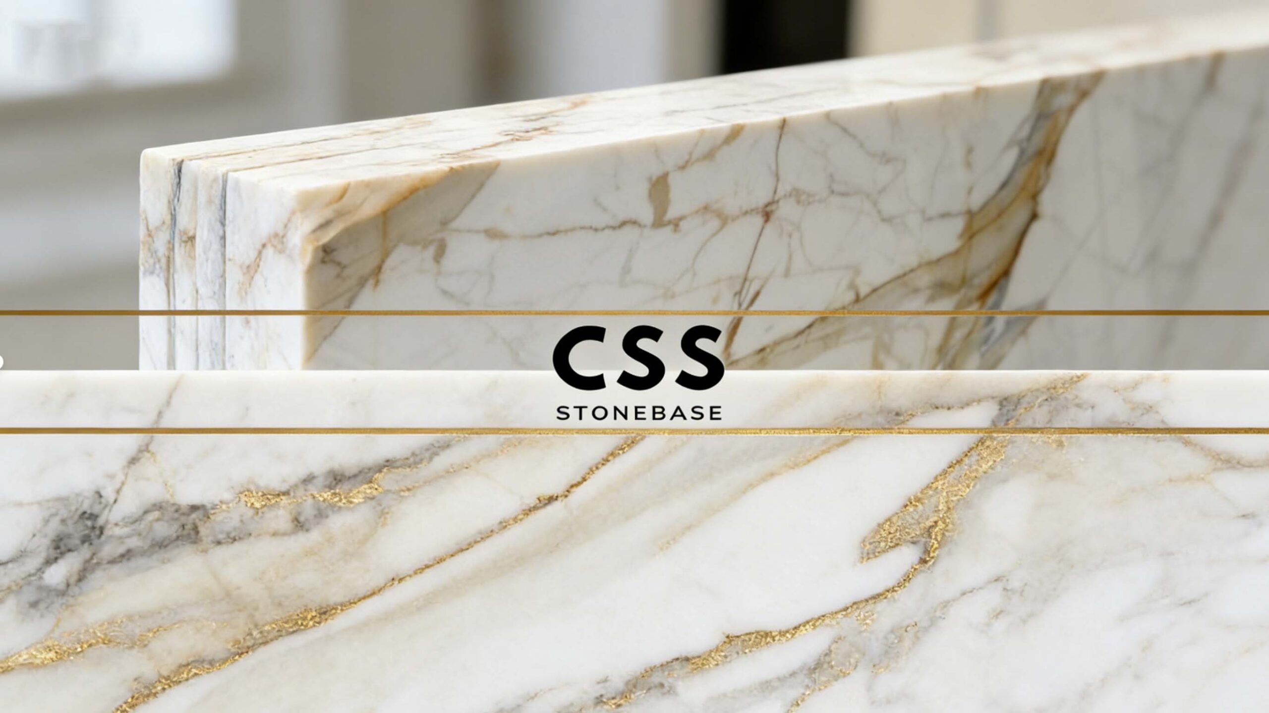Calacatta Gold marble feature wall in a modern luxury interior, highlighting dramatic gold veining and spatial focus