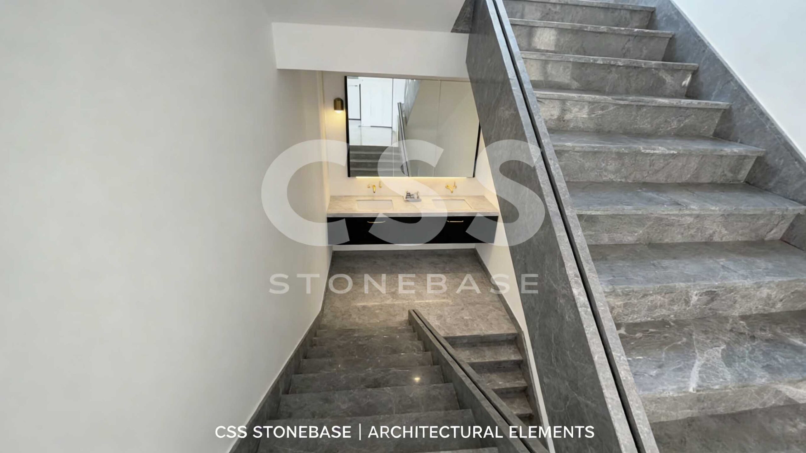 Grey Emperador marble slabs used in modern architectural flooring, highlighting dark grey marble texture and real interior application