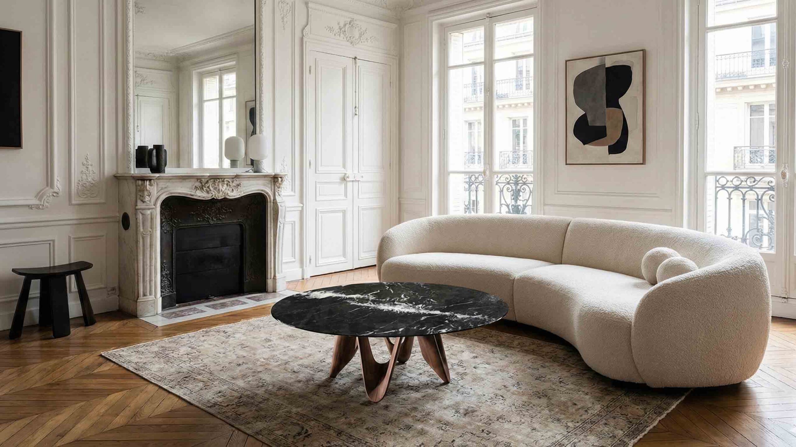 Nero Marquina black marble coffee table top styled in a modern European living room.